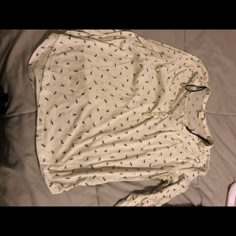 White patterned V-neck top